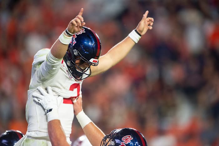 Mississippi Rebels quarterback Jaxson Dart (2) celebrates his touchdown run as Auburn Tigers take on Mississippi Rebels at Jordan-Hare Stadium in Auburn, Ala., on Saturday, Oct. 21, 2023.